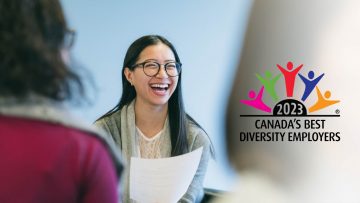 Smiling staff member, logo "2023 Canada's Best Diversity Employers"