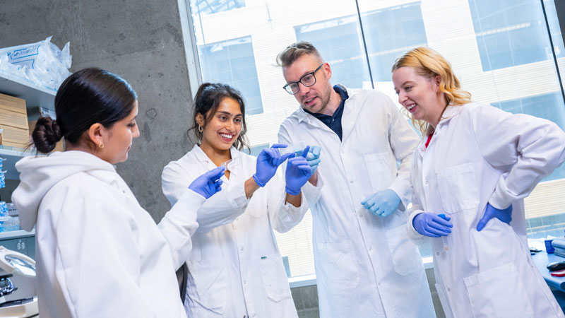 Dr. Mark Cembrowski and graduate students in the lab