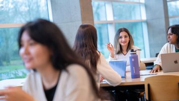 Students in conversation on campus